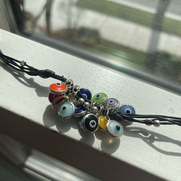 Beautiful pleather bracelet with colored evil eye pendants - Picture 2 of 5